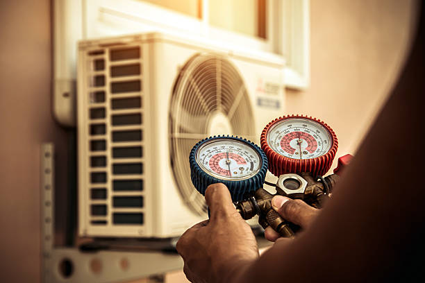 Professional Ductwork Repair technician working in Carle Place, NY